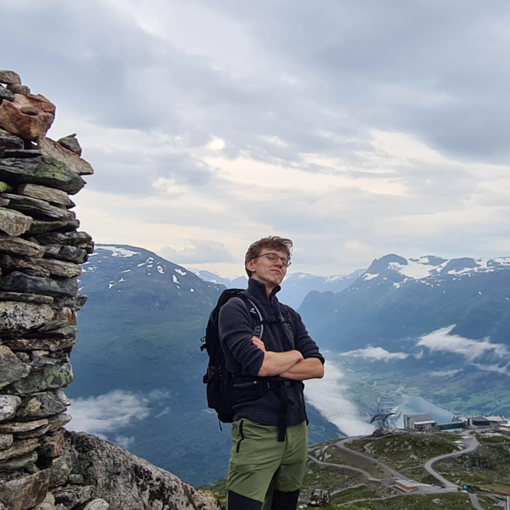 Kam hiking in his backyard at home in Norway